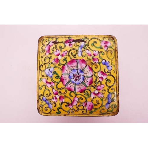 23 - A C19th Cantonese square enamel box with cover, decorated with flowers, motifs and scrolls on a yell... 