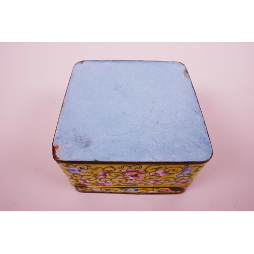 23 - A C19th Cantonese square enamel box with cover, decorated with flowers, motifs and scrolls on a yell... 