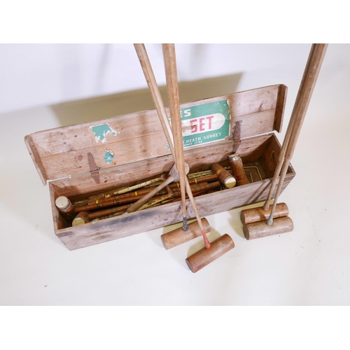 25 - A Jacques croquet set and four spare mallets, box 42