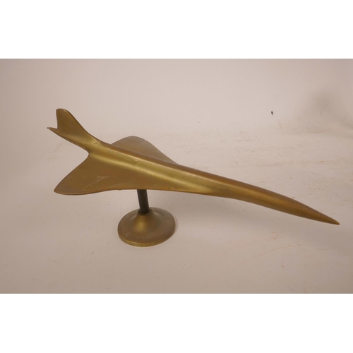 41 - Various brass items, including three hand turned pairs of candlesticks, and a model Concorde, 13