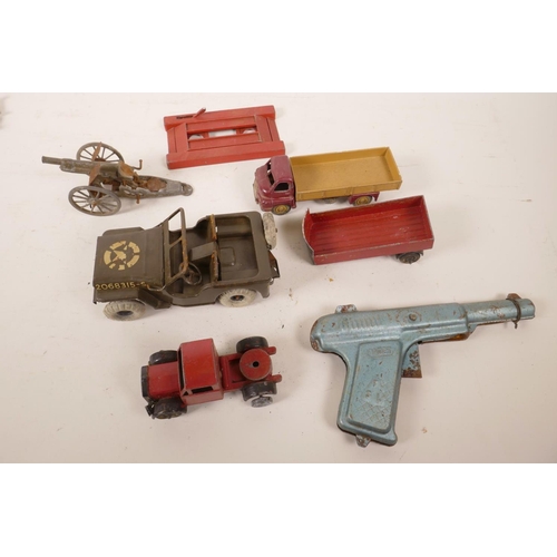 44 - Nine Dinky die cast model aircraft, mid C20th, various other metal vehicles, and a metal cadet gun, ... 