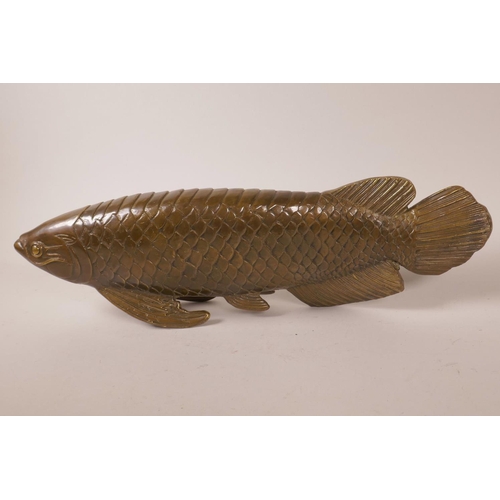 46 - An Oriental brass model of a carp, 17