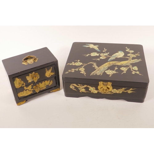 67 - An Oriental lacquered jewellery box decorated with birds and flowering branches, 9½