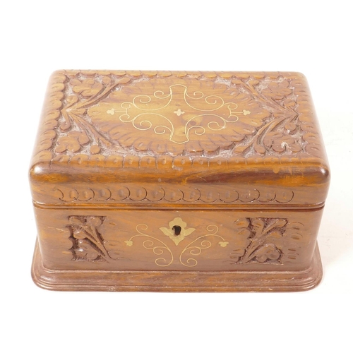 72 - An Indian carved hardwood jewellery box with inlaid brass decoration, 9