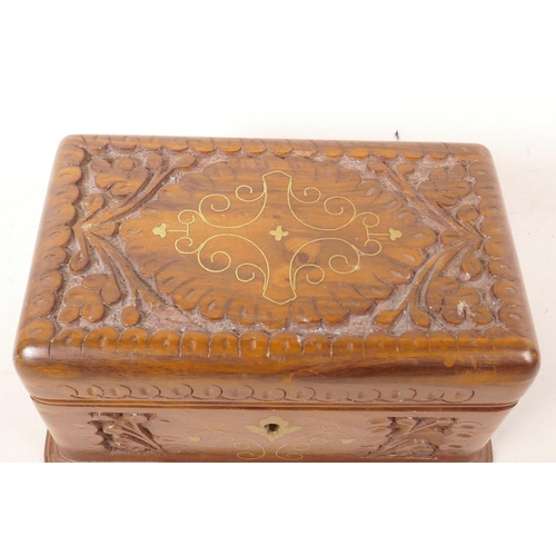 72 - An Indian carved hardwood jewellery box with inlaid brass decoration, 9