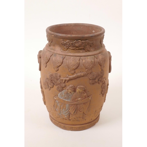 35 - A Chinese earthenware jar with raised decoration of a figure and dragon, A/F losses and chips, 7