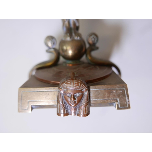 54 - A French Art Deco  brass and copper tazza, the top with engraved zodiac figures and a central copper... 