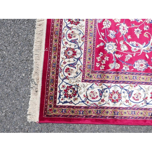 1170 - Red ground Kashmir rug with traditional Shabaz medallion design, 60