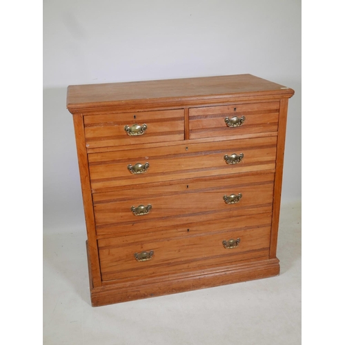 1175 - A Victorian satinwood chest of two short and three long drawers, 42