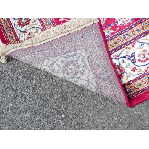 1170 - Red ground Kashmir rug with traditional Shabaz medallion design, 60