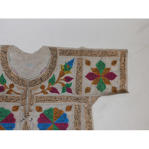 62 - An Islamic linen tunic, decorated with polychrome patterns and all over calligraphy, 42