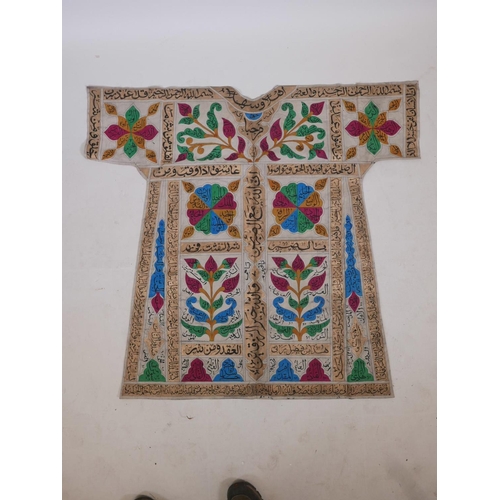 62 - An Islamic linen tunic, decorated with polychrome patterns and all over calligraphy, 42