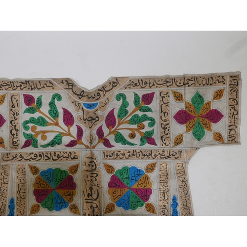 62 - An Islamic linen tunic, decorated with polychrome patterns and all over calligraphy, 42