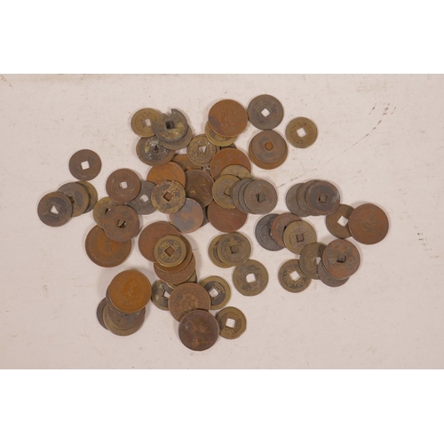 67 - A quantity of antique Chinese coins, 334 grams