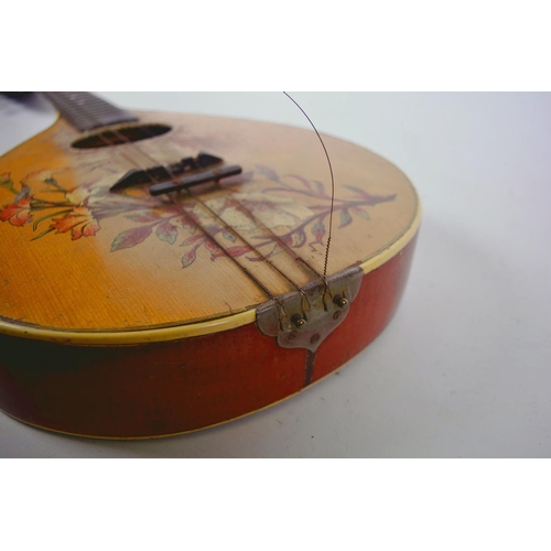 1 - A vintage flat back mandolin with rosewood finger board and floral painted decoration, 24