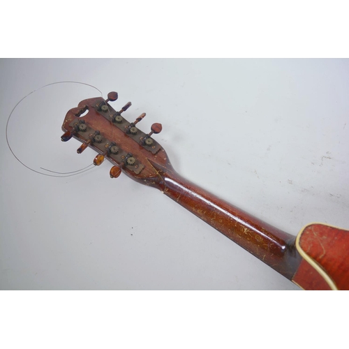 1 - A vintage flat back mandolin with rosewood finger board and floral painted decoration, 24