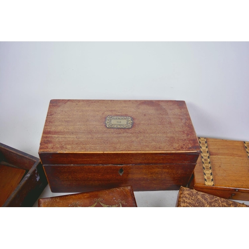 14 - A collection of vintage and antique boxes including a mahogany tea caddy etc