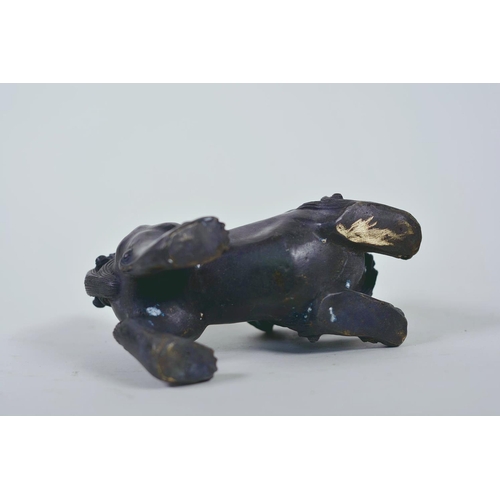 19 - A pair of Oriental patinated bronze figures of fo dogs, 6