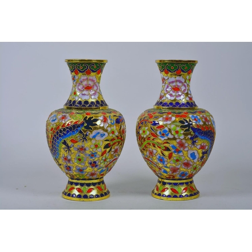 24 - A pair of Oriental cloisonné vases decorated with dragons, 8