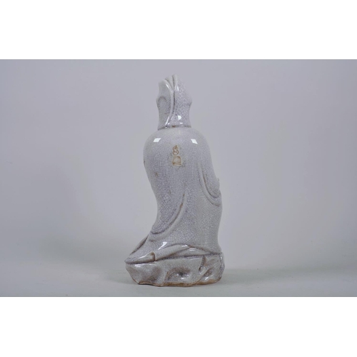 30 - A Chinese crackle glazed blanc de chine Quan Yin, impressed seal marks verso, 12