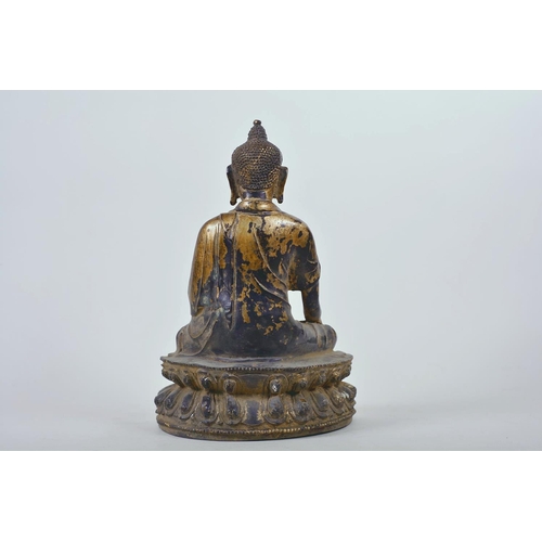 47 - A Chinese patinated bronze figure of Buddha seated in meditation, 12