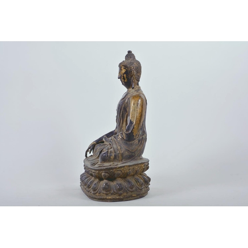 47 - A Chinese patinated bronze figure of Buddha seated in meditation, 12