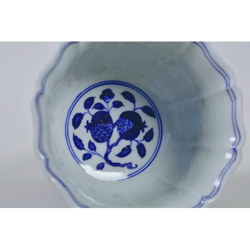 60 - A Chinese blue and white porcelain stem bowl with a lobed rim, ribbed stem and dragon decoration, 6 ... 