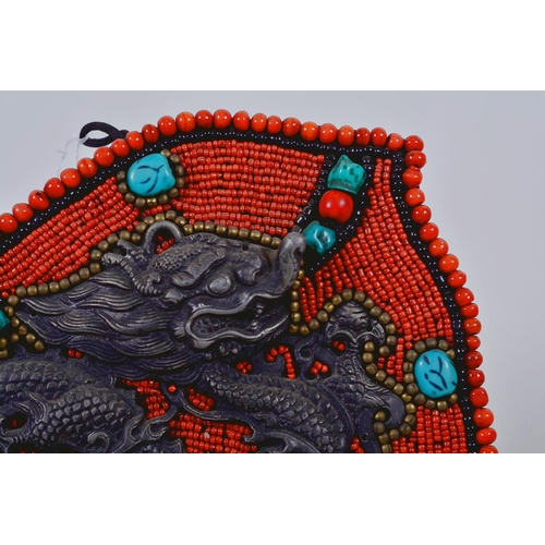 8 - A Tibetan wall hanging decorated with agate, coral and turquoise beads, 13