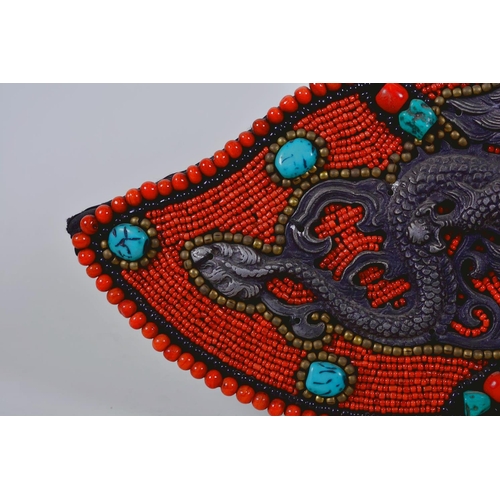 8 - A Tibetan wall hanging decorated with agate, coral and turquoise beads, 13