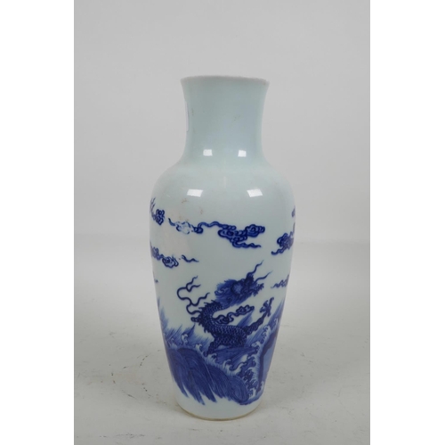 16 - A Chinese blue and white porcelain vase decorated with dragons and clouds, six character mark to bas... 