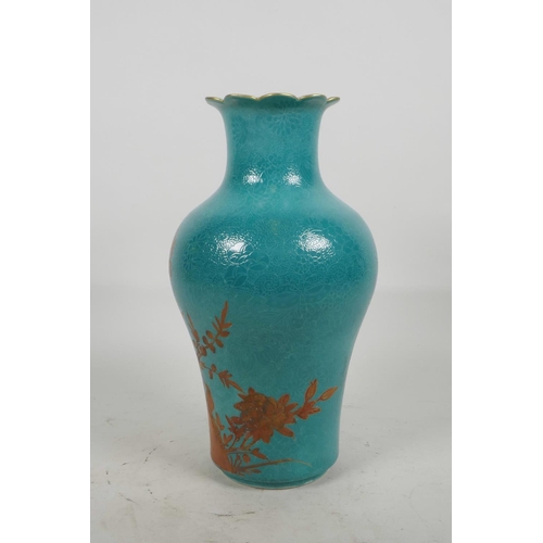 20 - A Chinese blue ground porcelain vase with incised self coloured floral decoration, overpainted with ... 