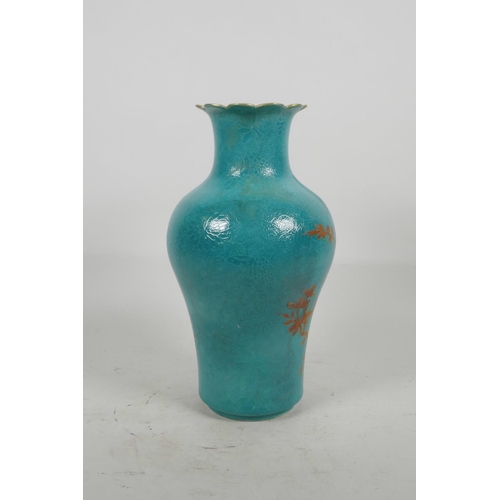 20 - A Chinese blue ground porcelain vase with incised self coloured floral decoration, overpainted with ... 