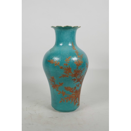 20 - A Chinese blue ground porcelain vase with incised self coloured floral decoration, overpainted with ... 