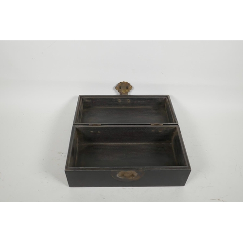 22 - An oriental ebonised hardwood box, with brass fittings, 10