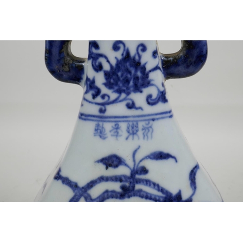 30 - A Chinese blue and white porcelain sectional vase with two lug handles and trailing branch decoratio... 