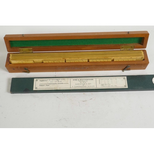 41 - A boxed set of engine divided boxwood surveyor's scale rules, together with a set of Eyre & Spottisw... 