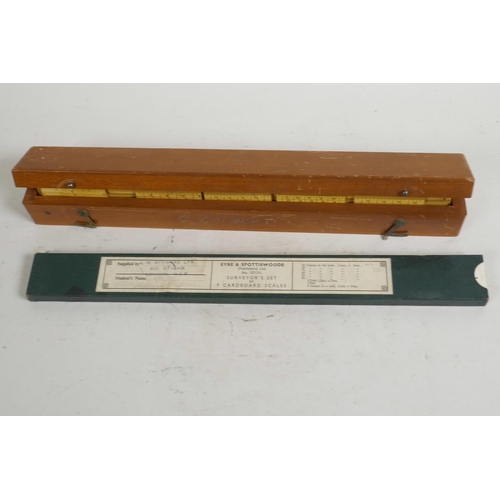 41 - A boxed set of engine divided boxwood surveyor's scale rules, together with a set of Eyre & Spottisw... 