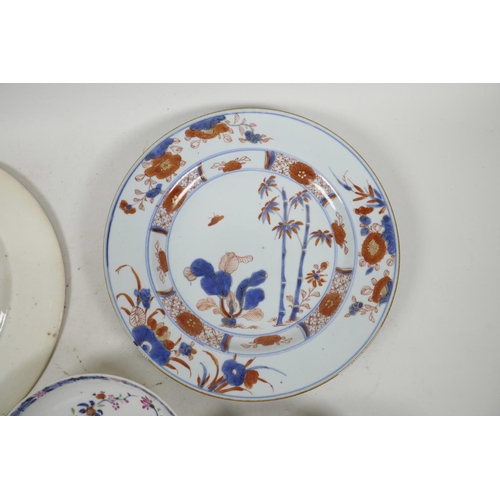 45 - Four C18th Chinese export porcelain plates in the Imari and famille rose style, and an early C19th D... 