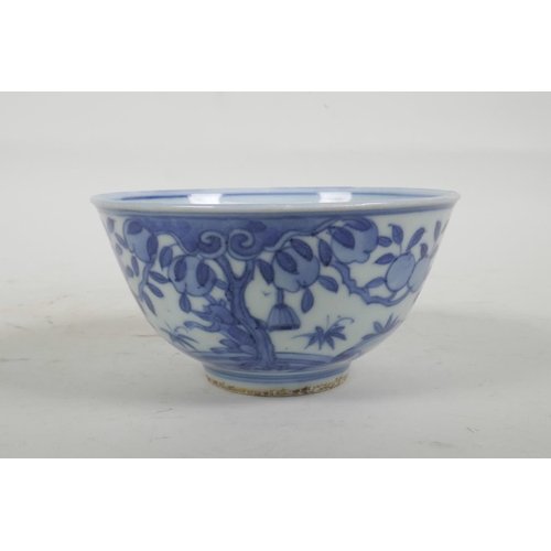 54 - A Chinese blue and white porcelain rice bowl decorated with deer amongst trees, six character mark t... 