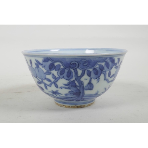 54 - A Chinese blue and white porcelain rice bowl decorated with deer amongst trees, six character mark t... 