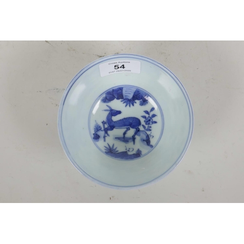 54 - A Chinese blue and white porcelain rice bowl decorated with deer amongst trees, six character mark t... 