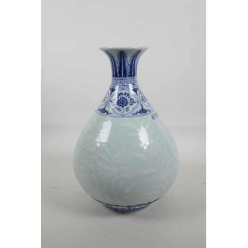 55 - A Chinese blue and white porcelain pear shaped vase with a flared rim, decorated with birds amongst ... 