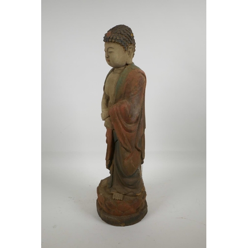 8 - A Chinese carved wood Buddha with cracked polychrome paintwork, 22