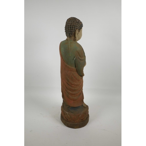 8 - A Chinese carved wood Buddha with cracked polychrome paintwork, 22