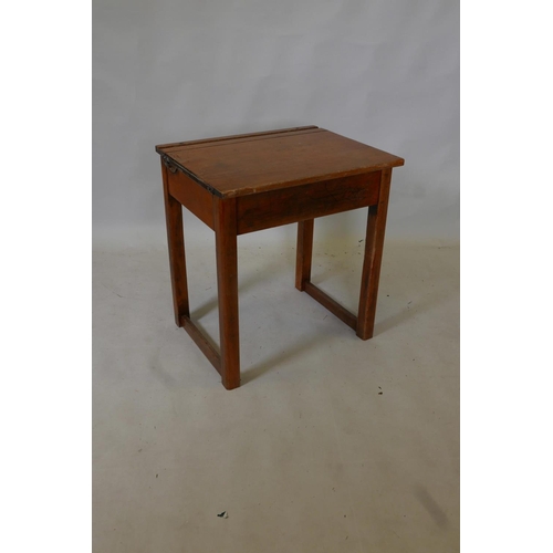 1840 - An early C20th child's pine school desk, 22