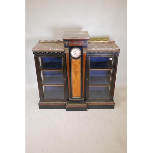 1830 - A C19th French breakfront pier cabinet, with brass inlaid ebonised doors and gilt brass classical mo... 