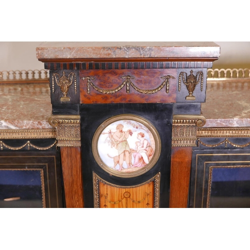 1830 - A C19th French breakfront pier cabinet, with brass inlaid ebonised doors and gilt brass classical mo... 