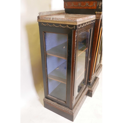 1830 - A C19th French breakfront pier cabinet, with brass inlaid ebonised doors and gilt brass classical mo... 