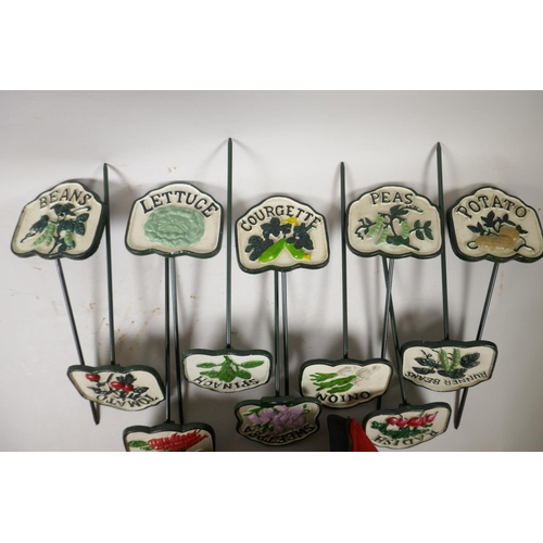 11 - A set of twelve painted iron vegetable garden labels, 11½