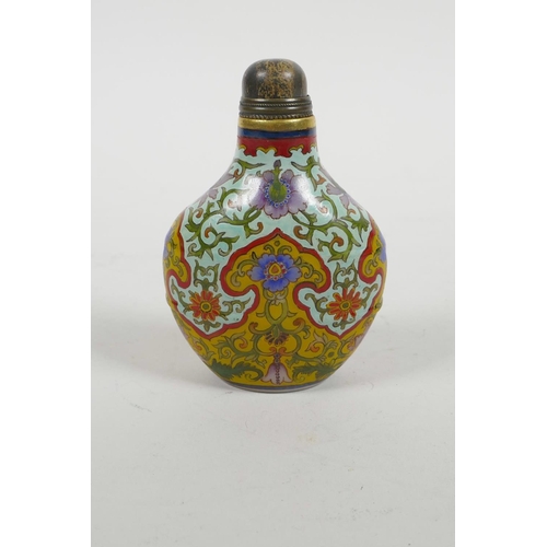 15 - A Peking glass snuff bottle with polychrome floral enamel decoration, four character mark to base, 3... 